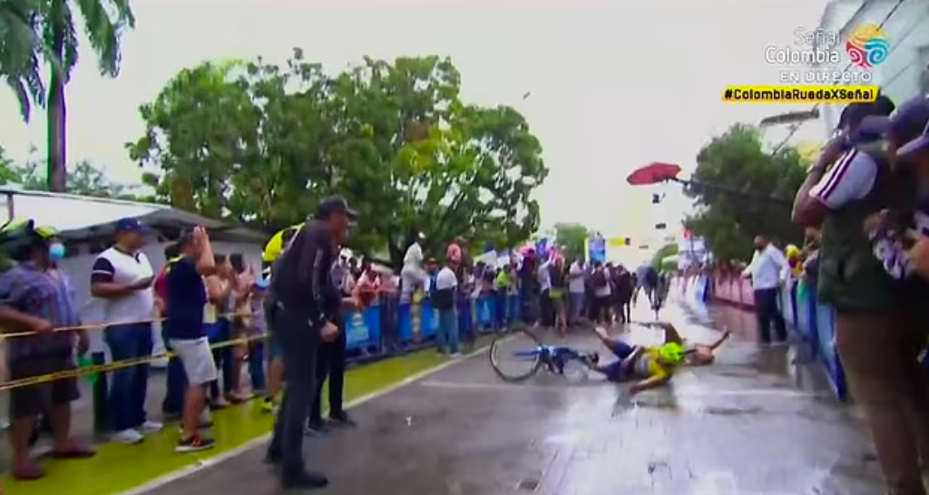 COLOMBIAN CYCLIST LUIS CARLOS CHIA CRASHES INTO HIS WIFE AT FINISH LINE